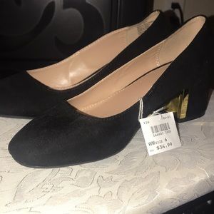Black velvet heels with gold bottom